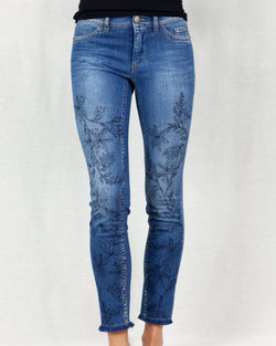 Mid-rise denim jeans with a floral illustration and frayed ankle hem