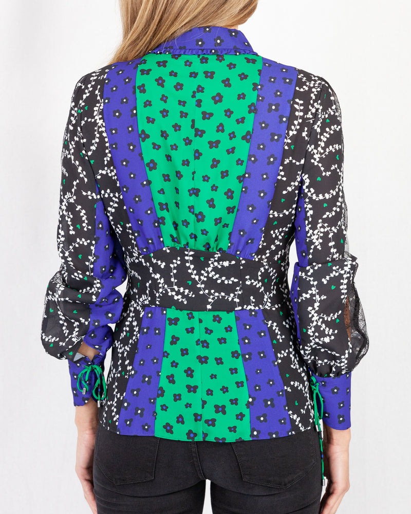 back of printed floral blouse with fitted waist and peplum