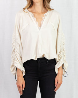 Beige blouson shape blouse with rounded collar 